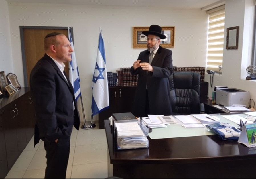 Rabbi Yehoshua Fass (left) in his meeting with Chief Rabbi David Lau
