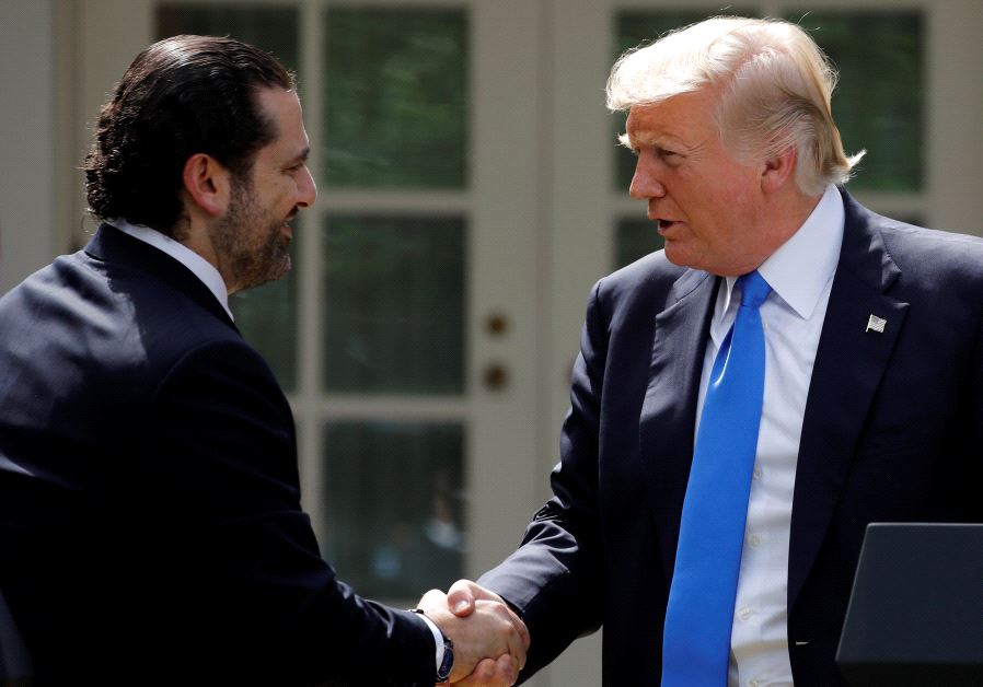 US President Donald Trump shakes hands with Lebanese Prime Minister Saad al-Hariri during a press conference in the Rose Garden of the White House in Washington, US, July 25, 2017.