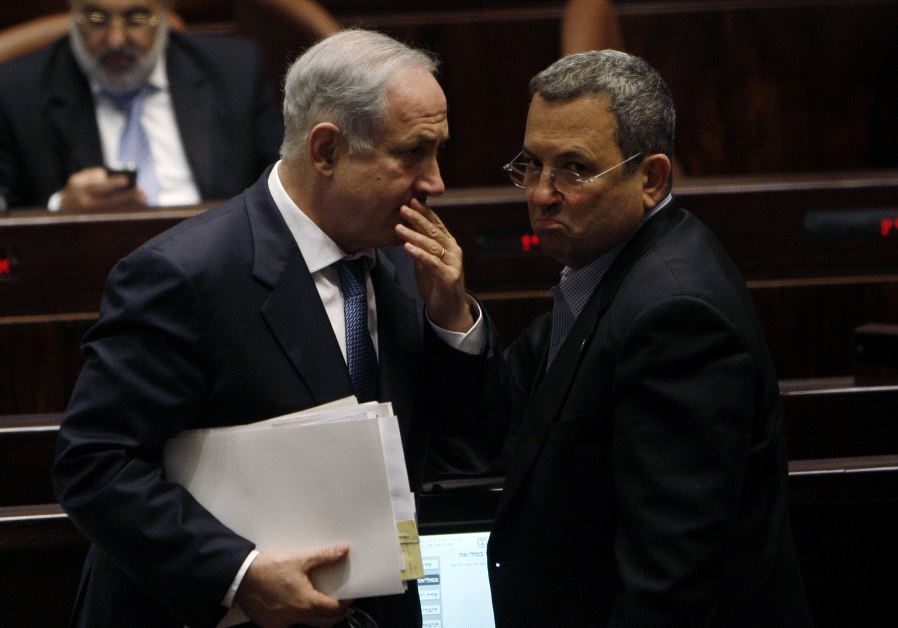 Israel's Prime Minister Benjamin Netanyahu (L) speaks with Ehud Barak at the Knesset, the Israeli parliament, in Jerusalem June 8, 2009.