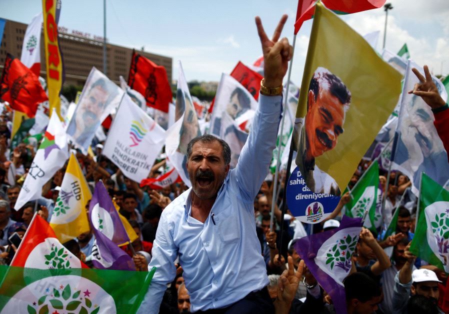 Pro-Kurdish demonstrators attend a rally as they shout slogans in Istanbul, Turkey, June 5, 2016. 